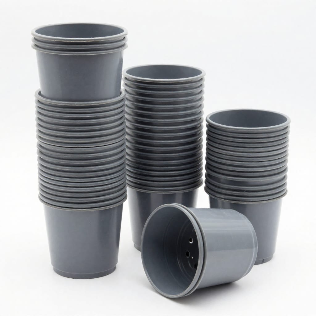 Stack of plastic plant pots with drainage holes